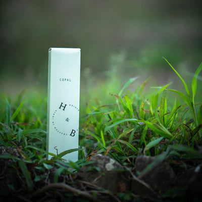 White rectangular object with 'H & B' branding in grass