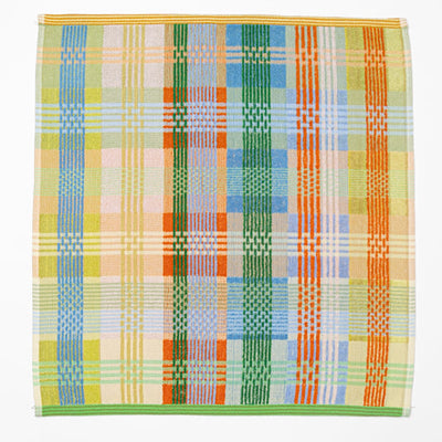 Colorful plaid towel on a white background