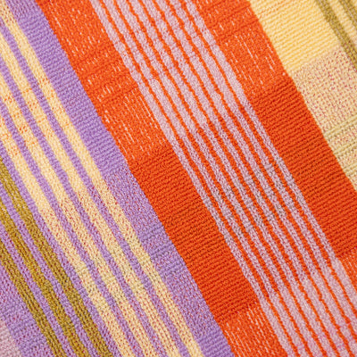 Close-up of a textured fabric with multicolored stripes