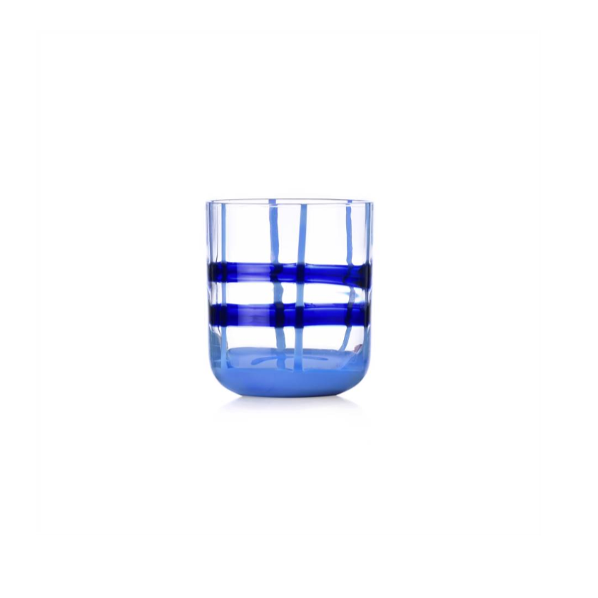 Blue glass tumbler with horizontal stripes on a white background