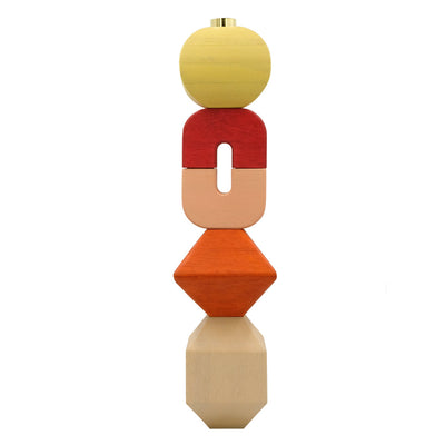 Pillar wooden candle holders - in sunny shades of yellow, pink and orange stacked on top of eachother