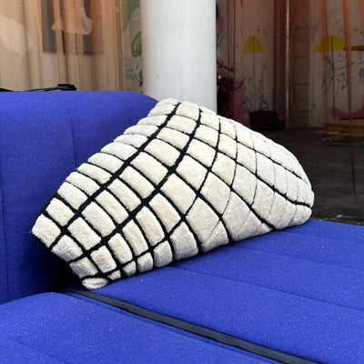 The Grip Wool Tufted Cushion by Trine Krüger | Triangular Shape | Black Grid Design on White Base | Haus Üger Exclusive
