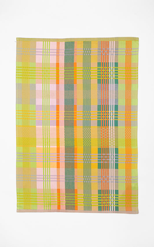 Plaid patterned towel with pastel colors on a white background
