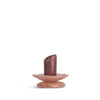Small brown ceramic incense holder on a white background