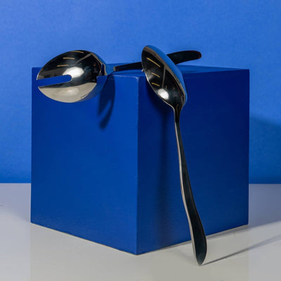 shiny, stainless steel salad servers