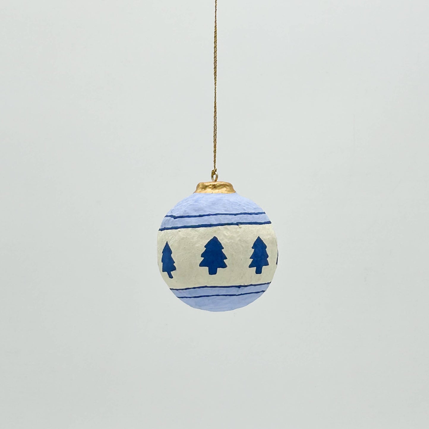 Decorative Christmas ball with tree pattern on a white background