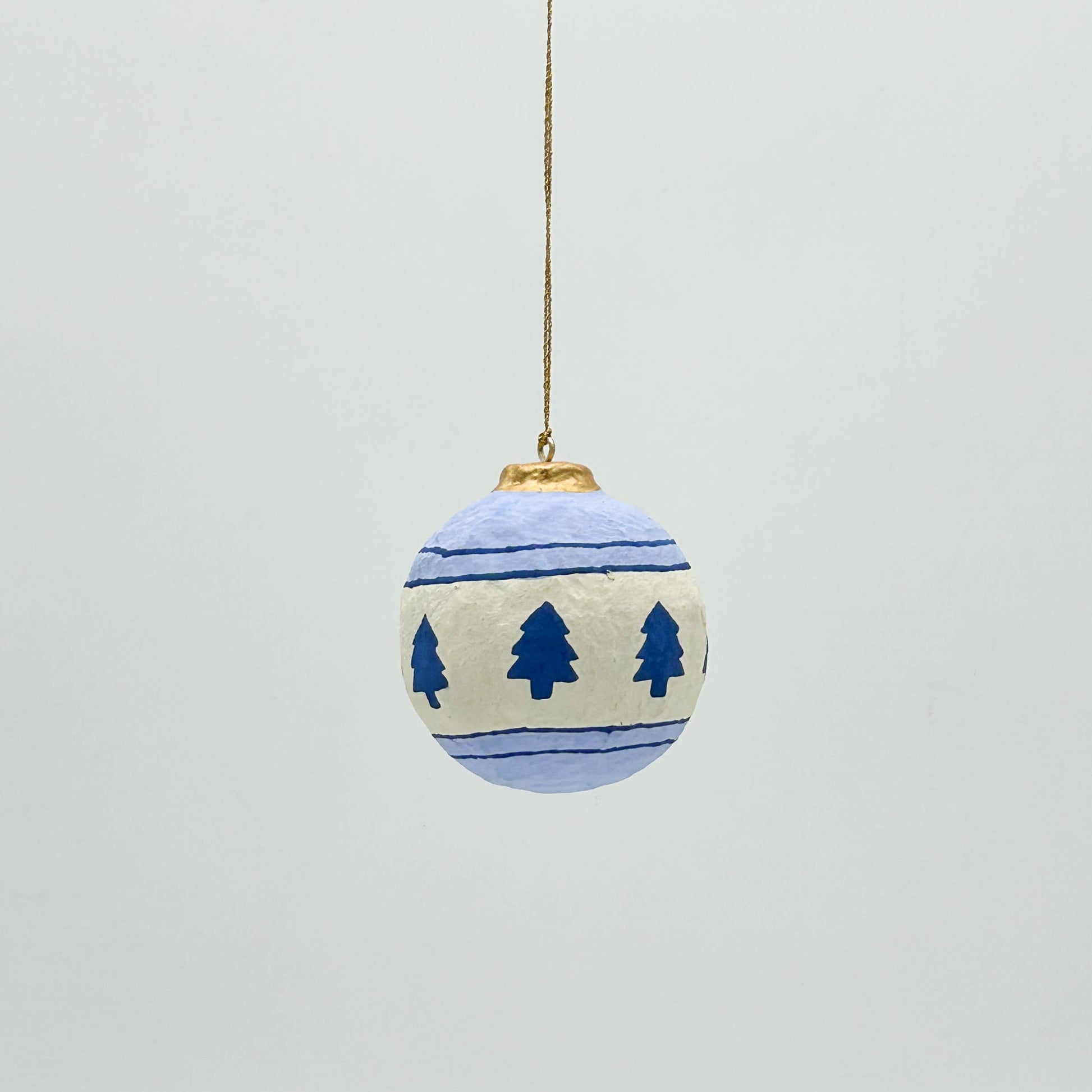 Decorative Christmas ball with tree pattern on a white background