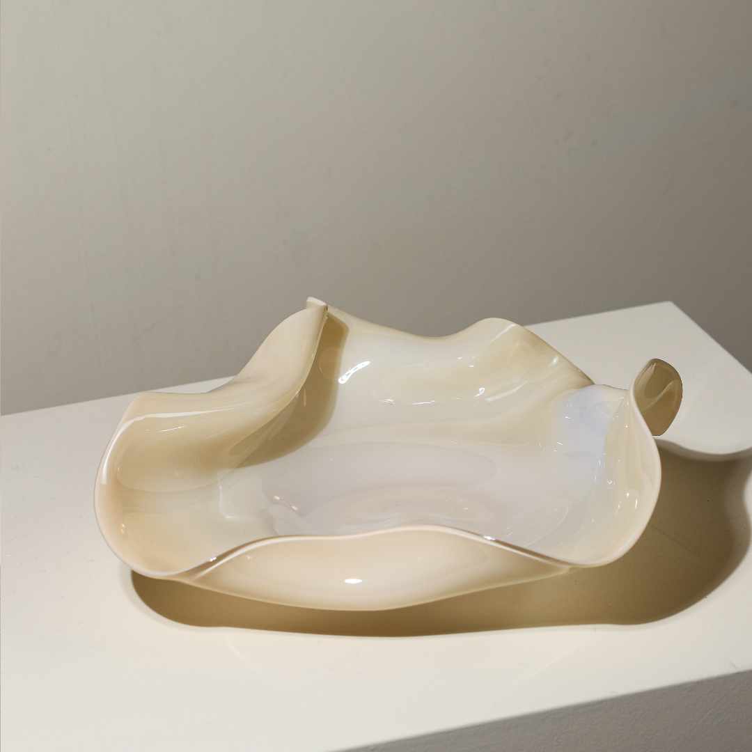 "Dansing" Dish Medium - a glass serving dish by the designer Rikke Stenholt in an oyster yellow and cream shade, available at NAVE shop